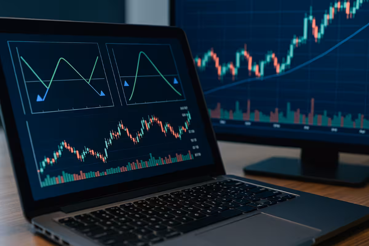 Options strategy payoff graphs and market charts on trading screens, illustrating how Iron Condor and Iron Butterfly strategies are built.